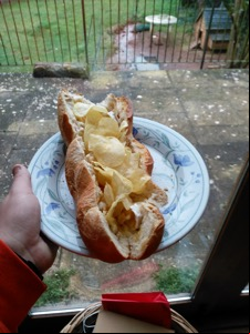 Potato crisps and cheese in a baguette