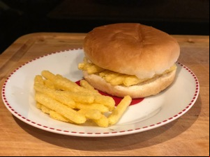 Chipsticks within and alongside a white roll
