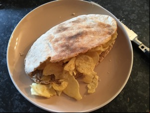 Wholemeal pita bread containing potato crisps