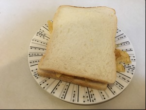 Crisps within two slices of white bread