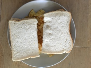 White crisp sandwich sliced in half